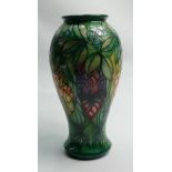 Moorcroft vase decorated with Rainforest pattern: Height 31cm, boxed.