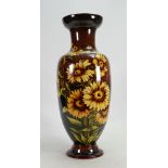 Doulton Lambeth large Faience vase: Hand painted with sunflowers by Mary Butterton, height 44.5cm.