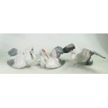 Three Lladro small crane figures: Fluttering, nesting and landing cranes - model numbers 1598,1599,