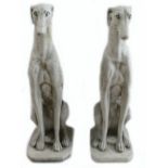 A pair of large reconstituted stone ornaments in the form of Greyhounds: Made in England and are