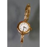9ct Rose gold ladies wristwatch with 9ct gold plated bracelet: