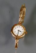 9ct Rose gold ladies wristwatch with 9ct gold plated bracelet: