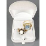 9ct gold ladies dress rings: One set with opal stone and the other yellow ring set with large grey