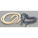 String of black cultured Pearls: Together with double row graduated cultured pearls,
