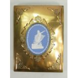 Blue & white oval plaque mounted In ornate brass frame: Overall 28 x 20cm