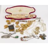 A collection of vintage costume jewellery: Including Accurist silver cocktail watch, pearls, chains,