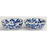 Pair of Chinese porcelain blue & white bowls with floral decoration: Diameter 13.5cm.