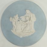 Wedgwood solid blue Jasperware Neoclassical Cupid as Oracle plaque: c1910, diameter of plaque 34.