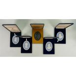 A good collection of Wedgwood Jasperware portrait plaques: All boxed, 5 items each 11cm.