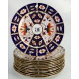 Twelve Royal Crown Derby Imari pattern plates: 23.5cm diameter.