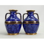 Pair of 19th century Wedgwood Queens Blue & White Glazed Portland Vases: Height 18cm.