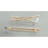 Two gold coloured golf related brooches: Both tested as 9ct gold, gross weight 6.2g.