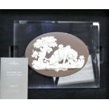 Wedgwood white on chocolate Jasper Bacchanalian Boys & Panther plaque: Oval plaque encapsulated in