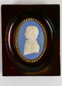 Wedgwood solid blue Jasper portrait medallion of John Flaxman Jnr: Flaxman impressed to front,