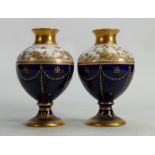 Wedgwood pair of gilded & enamelled 19th century vases: Slight chips to leading edge of one item,