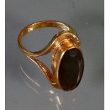 9ct ladies dress ring set with large oval brown stone: Size R, 6.7g.