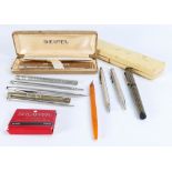 A collection of various vintage Fountain pens: Including Sheaffer and various pens, pencils etc.