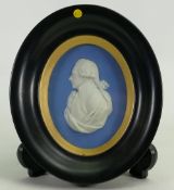 Wedgwood blue Jasper portrait medallion of Sir William Herschel: In wooden surround c1800,