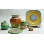 A collection of Shelley items to include: Vases, napkin stand, napkin ring, plates,