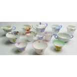 A collection of Shelley Regent shaped items to include: Milk jugs, sugar bowls, cups tea pot etc.