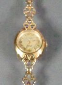 9ct gold Rotary ladies watch with 9ct bracelet 12.