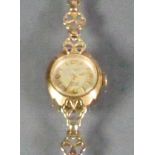 9ct gold Rotary ladies watch with 9ct bracelet 12.