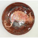 Lise B Moorcroft large hand thrown bowl: In browns with shells and seahorses. Lifted glaze on rim.