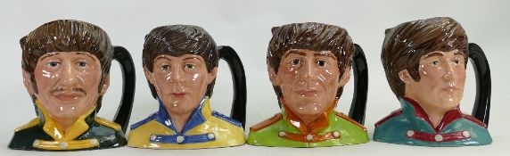 Royal Doulton set of mid size Character Jugs The Beatles: Comprising John Lennon D6725,