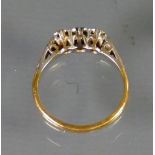 18ct three stone Diamond ring: Size J, 2.6g.