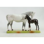 Beswick Mare and Foal on base: Beswick grey mare with dark brown foal on ceramic grass base model