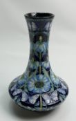 Moorcroft trial vase decorated with blue poppies and butterflies: Dated 13/5/2002. Boxed.