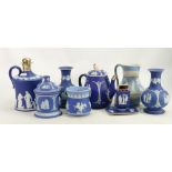 A collection of Wedgwood 19th century Jasperware to include: Dark blue teapot, vases,