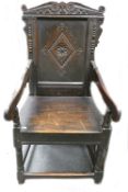 17th century English oak Wainscott chair: Measuring 118cm high x 60cm wide x 58cm deep.