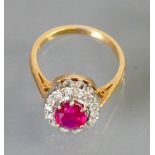 Ruby & Diamond cluster set 18ct gold ring: Ruby measures 8mm x 6mm approx. Size L.