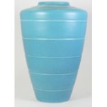 Keith Murray for Wedgwood: A large pale blue vase, with lined decoration to the body,