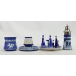 A collection of dark blue dip Wedgwood Jasperware items to include: Candlestick holder & snuffers,