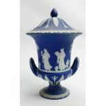 Wedgwood Dip blue & white Jasperware two handled Urn & cover: Restoration noted to lid, height 29cm.