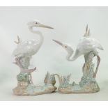 Lladro pair of Herons figure: 6882 damages & 6883, height of tallest 23cm.