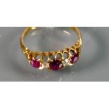 Victorian 18ct gold 3 stone Ruby & Diamond ring: Size K, 2.6g.