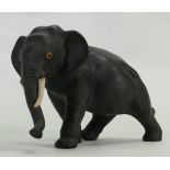 Wedgwood black Basalt model of an Elephant: With Orange eyes, height 10.