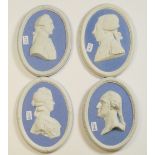 A collection of Wedgwood blue portrait plaques to include: Lady Banks, George Washington etc,