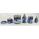 A collection of dark blue dip Wedgwood Jasperware to include: Biscuit barrel, sugar sifter,