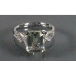 9ct White gold ladies Diamond dress ring set with large Aquamarine: Size P/Q, 3.3g.