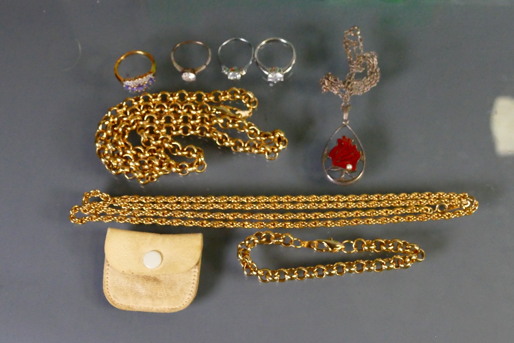 A collection of jewellery items: Including gold plated necklaces, silver dress rings etc.