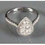 18ct White gold ladies Cluster Diamond ring: 1.0ct of diamonds, size P, 3.9g.