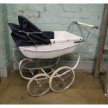 A child's Silver cross white and blue pram:
