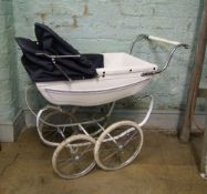 A child's Silver cross white and blue pram: