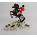 Beswick Rearing Huntsman 868: together with 4 hounds( huntsman with small grazes to both ears)(5)