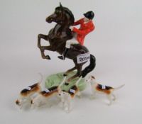 Beswick Rearing Huntsman 868: together with 4 hounds( huntsman with small grazes to both ears)(5)