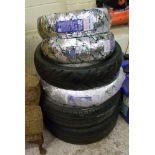 A quantity of car and motorbike tyres (6).